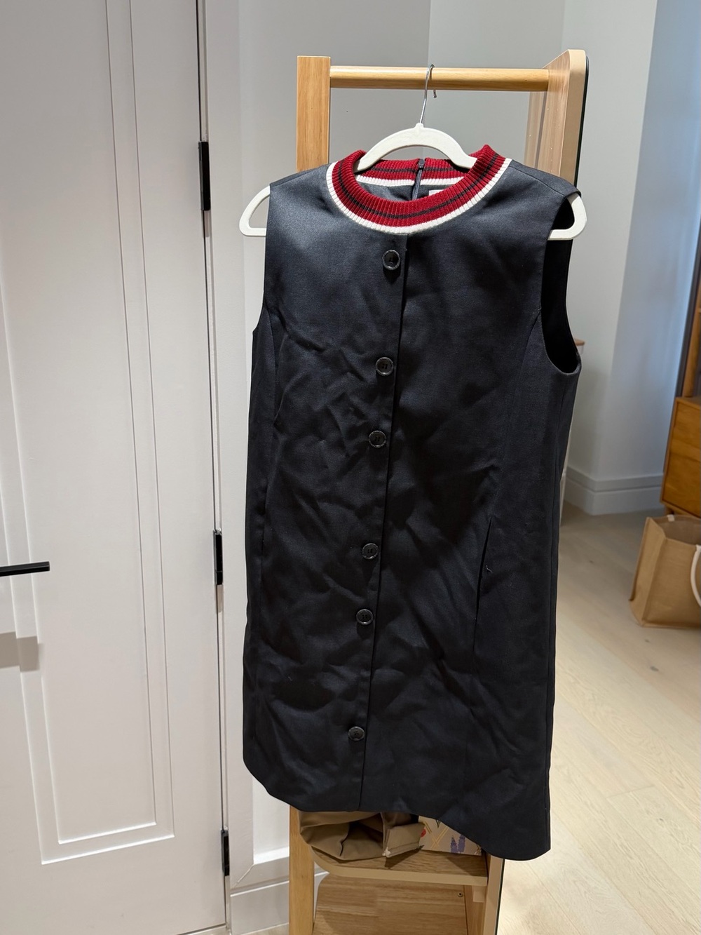 Sleeveless Black Mini Dress with Red-Trim Rib Neck